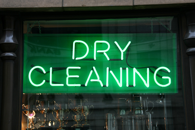 Shop window view in London - Dry Cleaning neon